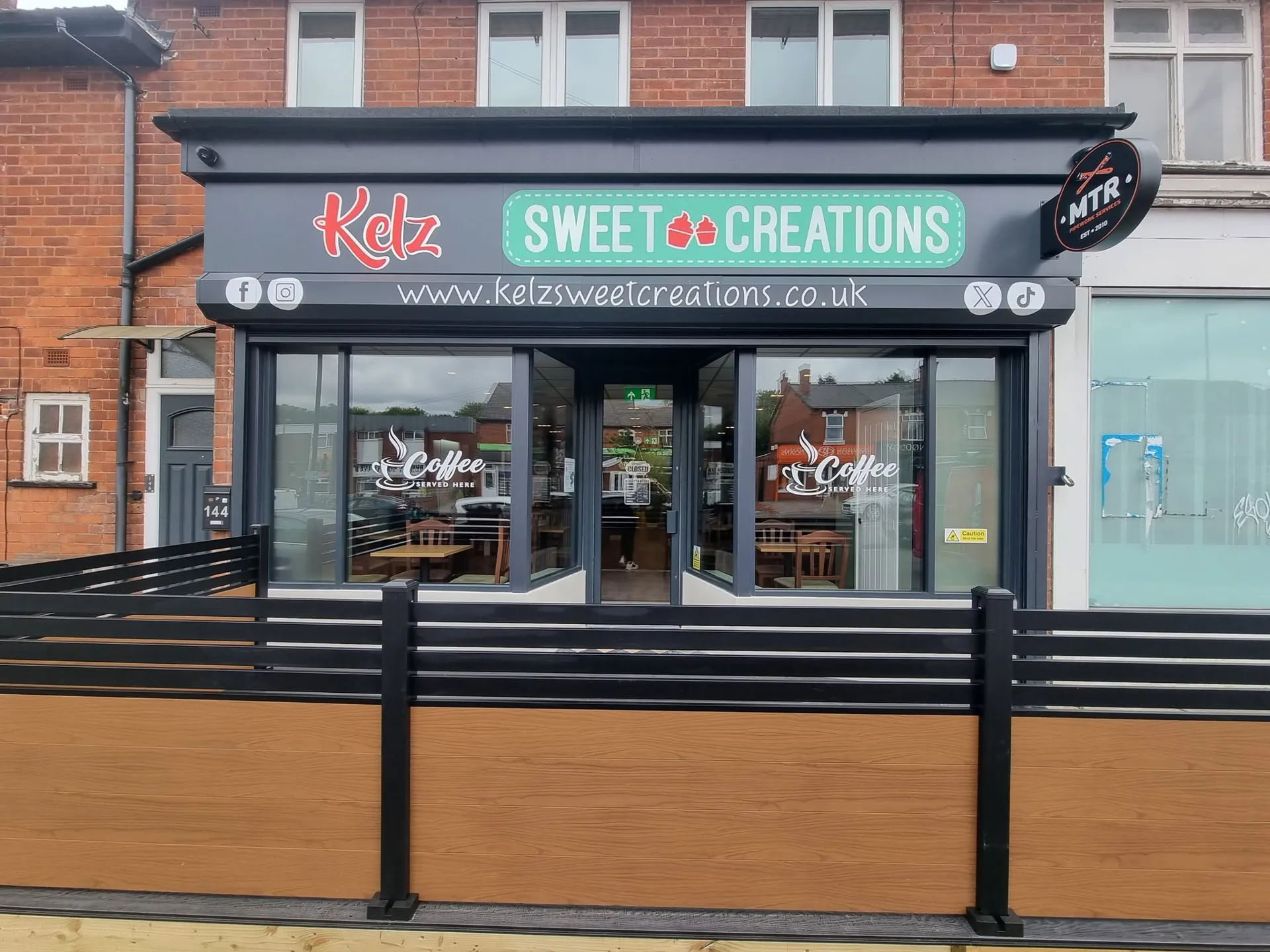 New shopfront fascia and window graphics for a sweet shop and coffee bar