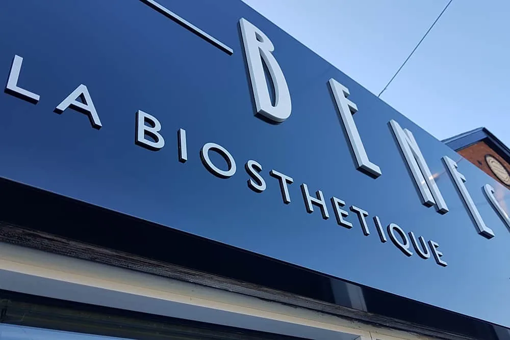 Brushed built-up letters on a navy fascia for a hair salon